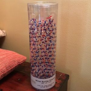 Wine bottle “dresses” gift bags, covers